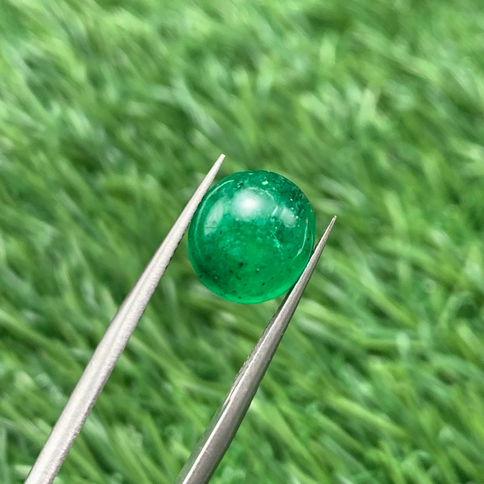 Emerald cabochon loose gemstone